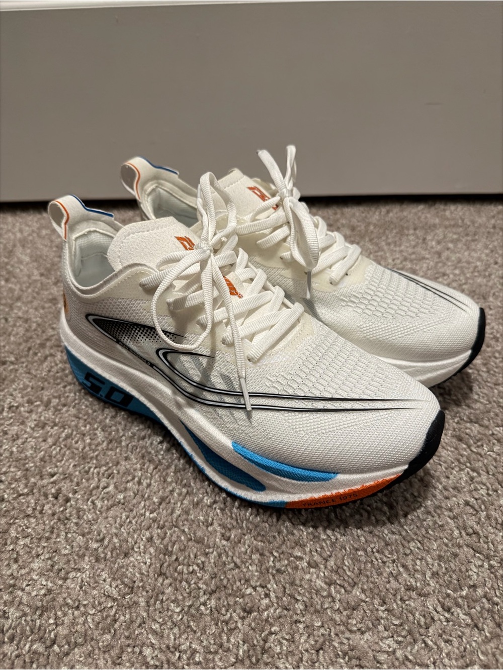Men's Athletic Running Shoes in White with Blue & Orange Accents
